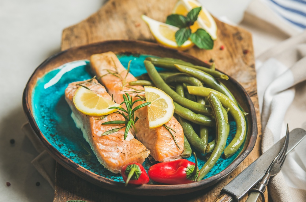 lemon garlic salmon on a cutting board