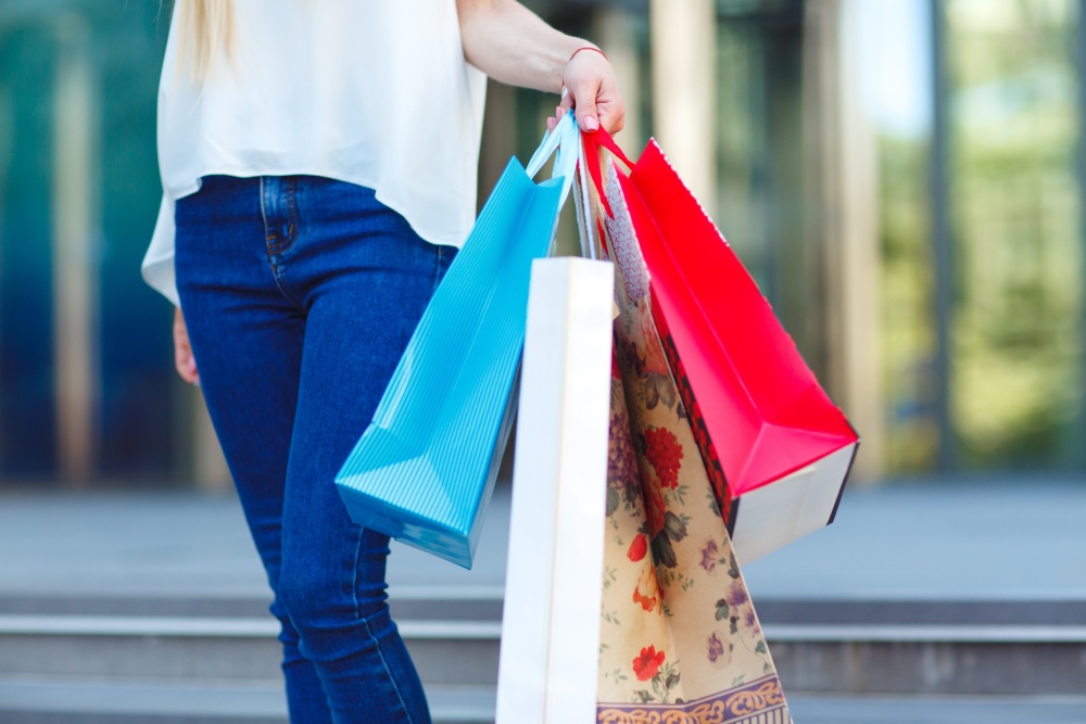 lady carrying shopping bags