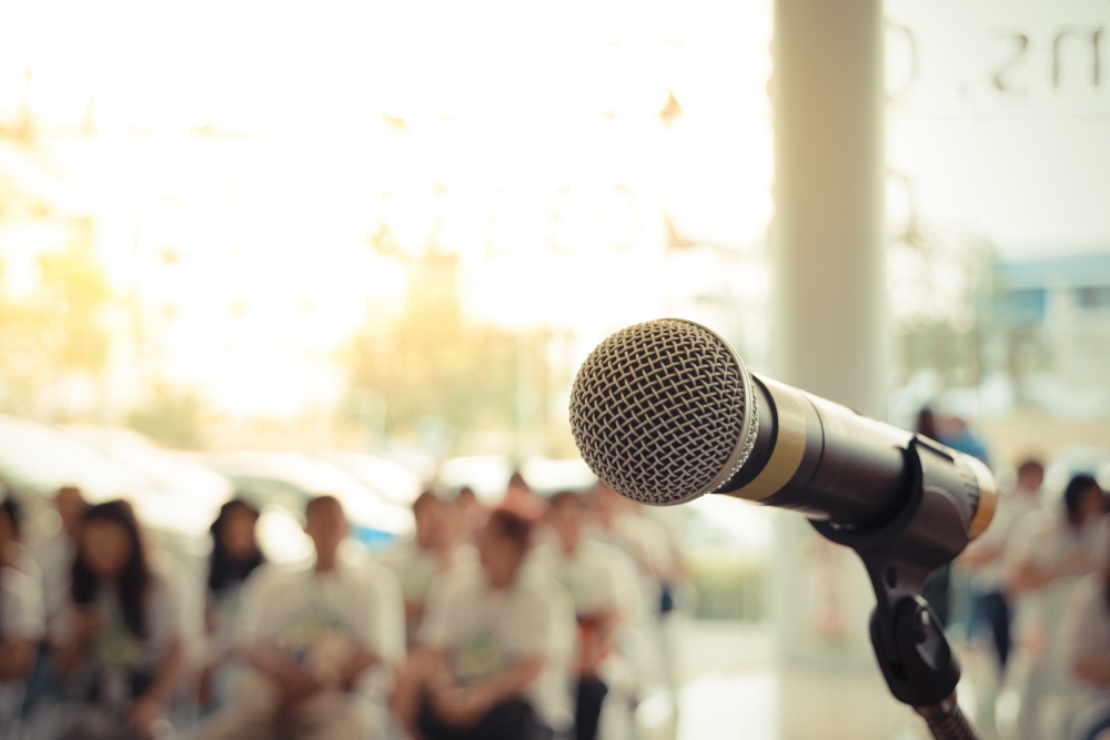 microphone in front of a crowd